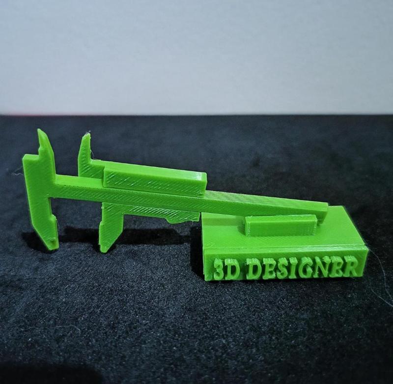Sculpture, with a caliper, as a homage to 3D designers