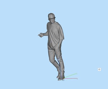 Man wearing hat and putting hands in pockets