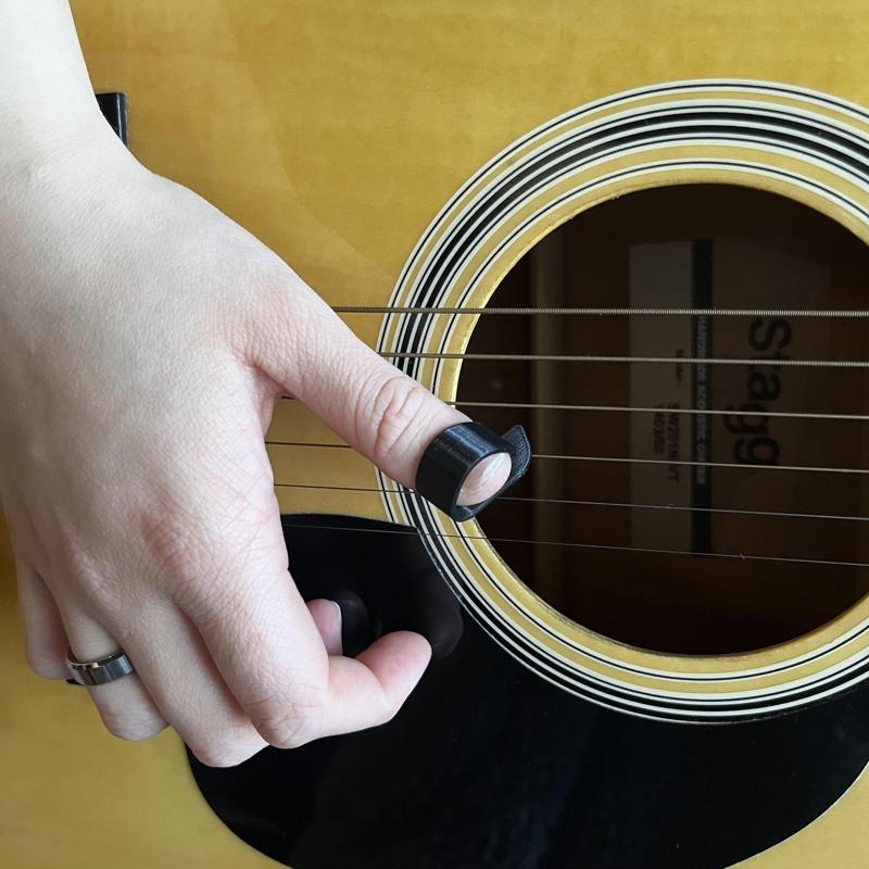 Guitar thumb pick