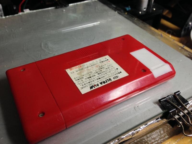 Ultra Man handheld game battery cover 