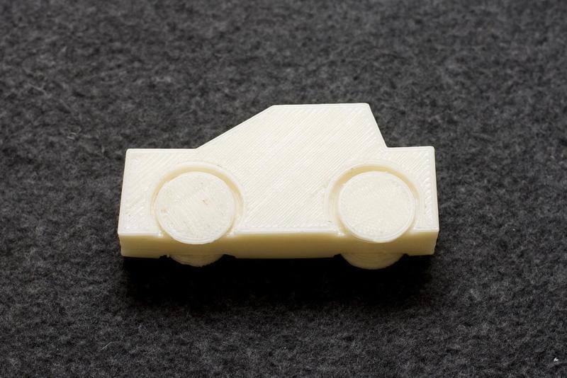 Toy Car with Captive Wheels