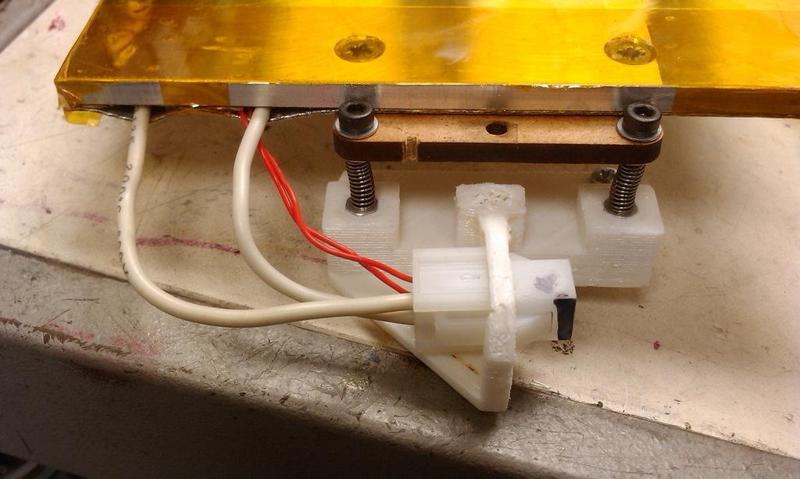 Upgraded spring mounting plates for Emaker Huxley and nicrome rework