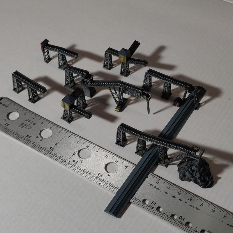 Conveyer system for 2-4mm wg and t-scale trains