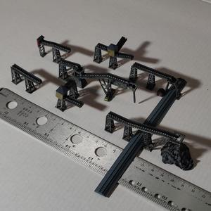 Conveyer system for 2-4mm wg and t-scale trains