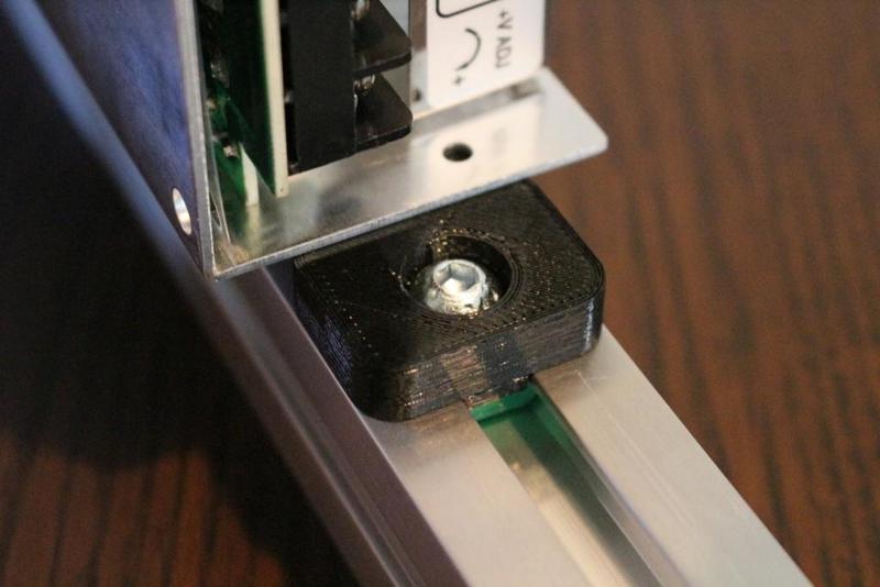 Power supply mount for 30 x 30 extruded aluminium profile