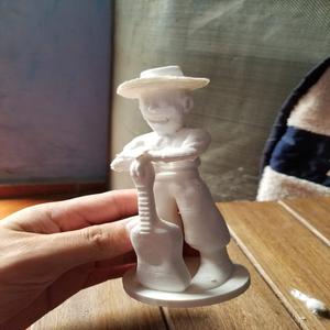 zenon con guitarra - estatuilla