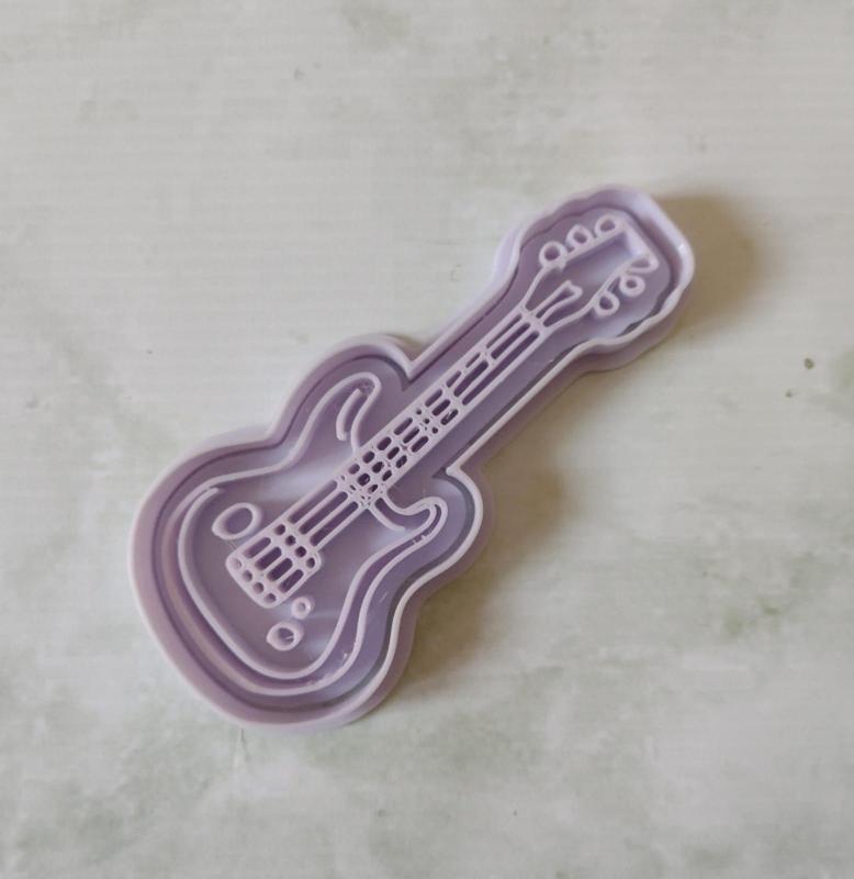 Guitarra Eléctrica cortante y sello