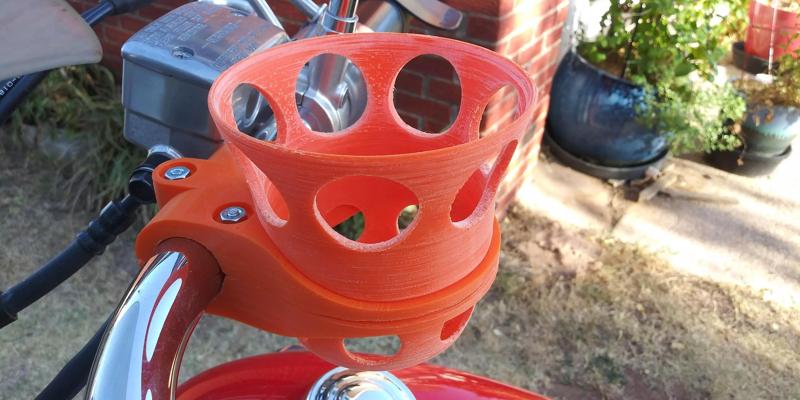 Handlebar cup holder