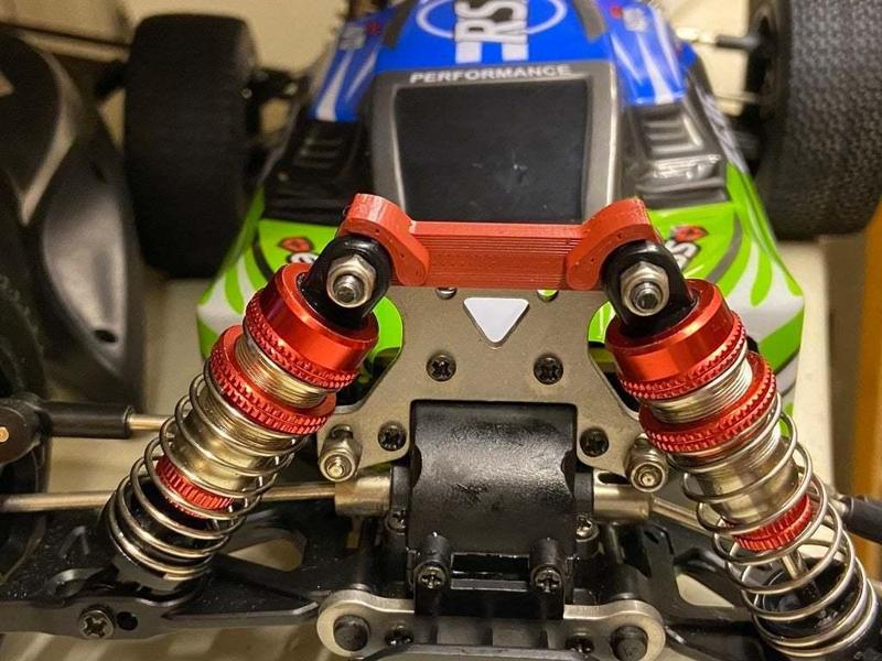 WLToys 144001 shock tower brace with shock guards