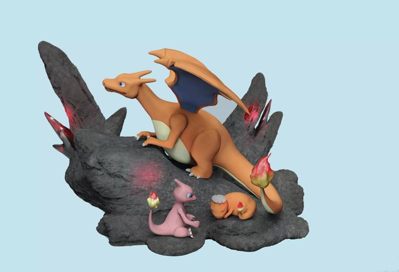 pokemon figurine of on rock