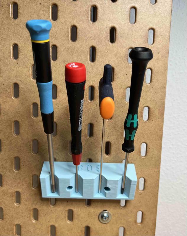 Skadis magnetic screw driver holder