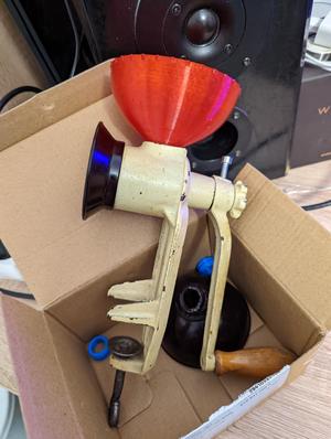 Hopper for poppy seed grinder