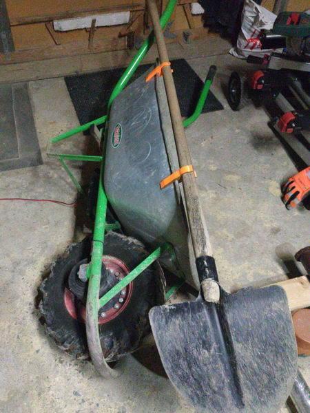 Wheelbarrow tool adapter