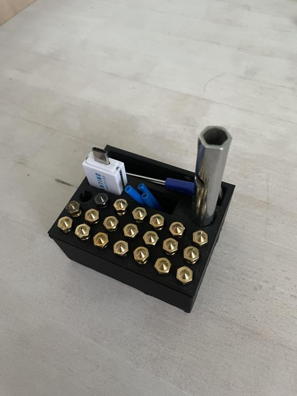 Nozzle and accessory holder for 3D printer