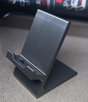 Phone holder with charging port