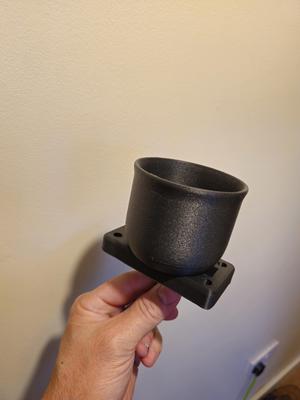 Cup holder for mounting plate.