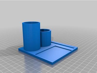 Pen and pencil holder with ruler slot