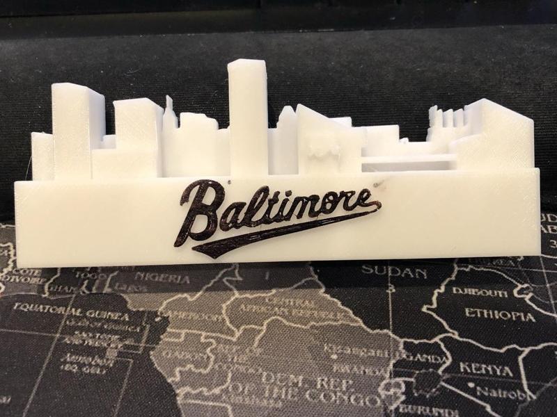 Flat Perspective Baltimore Skyline With Script Logo