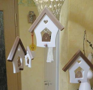 Spring mobile bird house