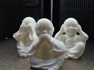 Three Wise Buddha Statues