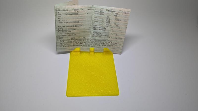 Vehicle registration document holder for keypad