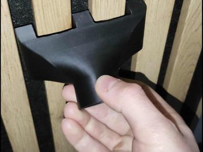 Vacuum cleaner attachment for vacuuming wall slats