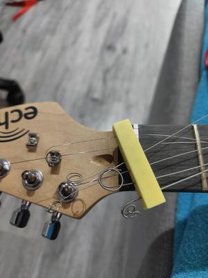 Guitar string holder for maintenance - customizable