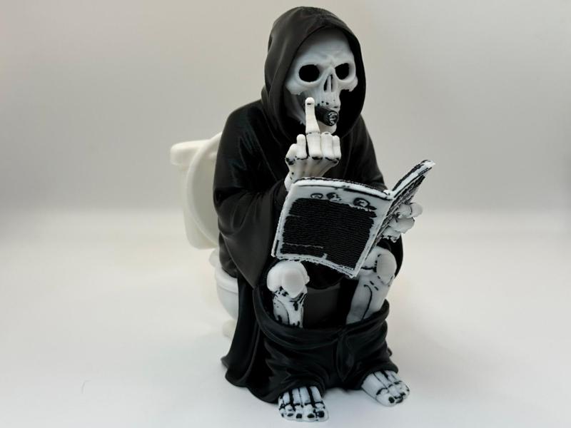 “Rest in Pieces” – Grim Reaper Bathroom Break