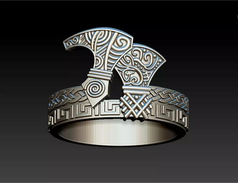 Viking ring with axes and ornaments