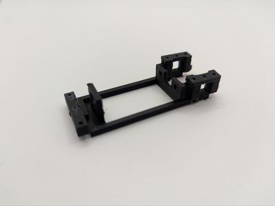 Tilting cradle on slot/scalextric line