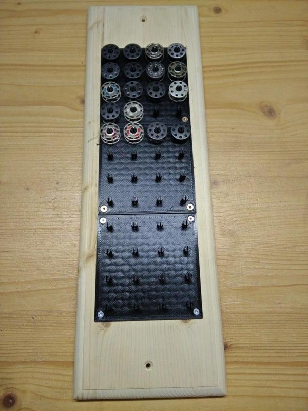 sewing machine bobbin organizer wallmount