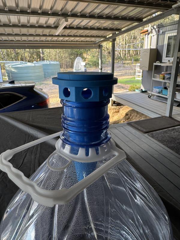 Fly trap for water cooler bottles.