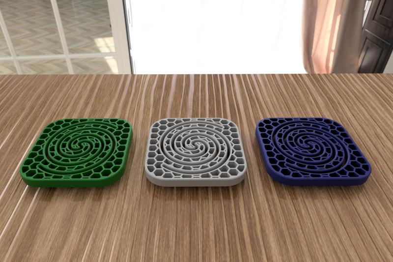 Coaster with spiral and hexagon pattern