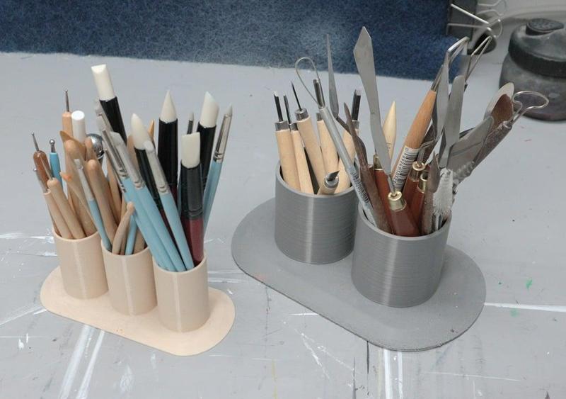 Pencil paintbrush xacto holder.