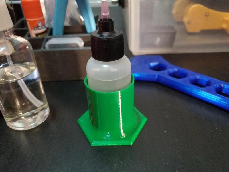 1oz sewing machine oil bottle holder.   