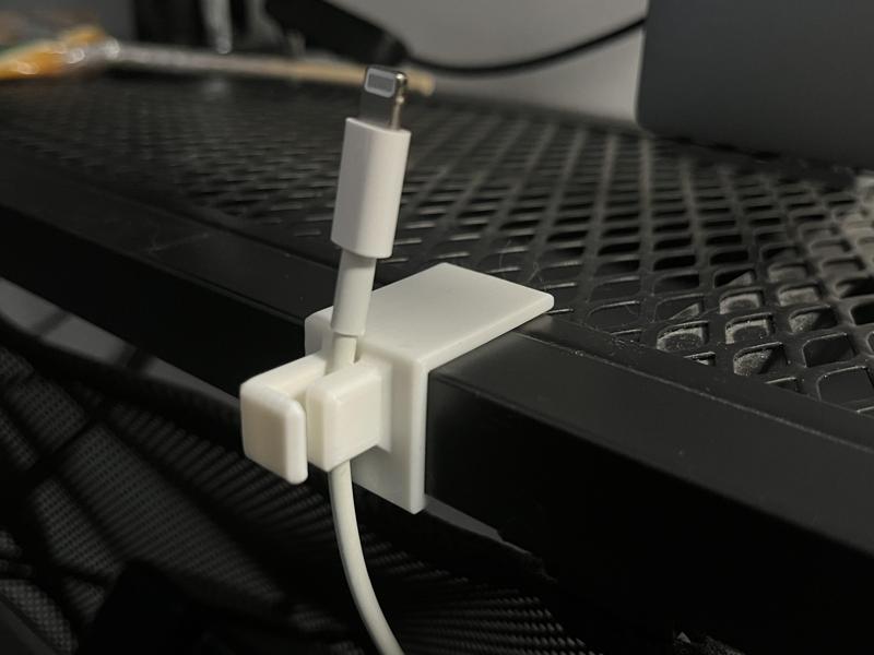 Phone cable holder for IKEA UTESPELARE table