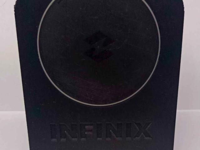 Infinix puck charger stand