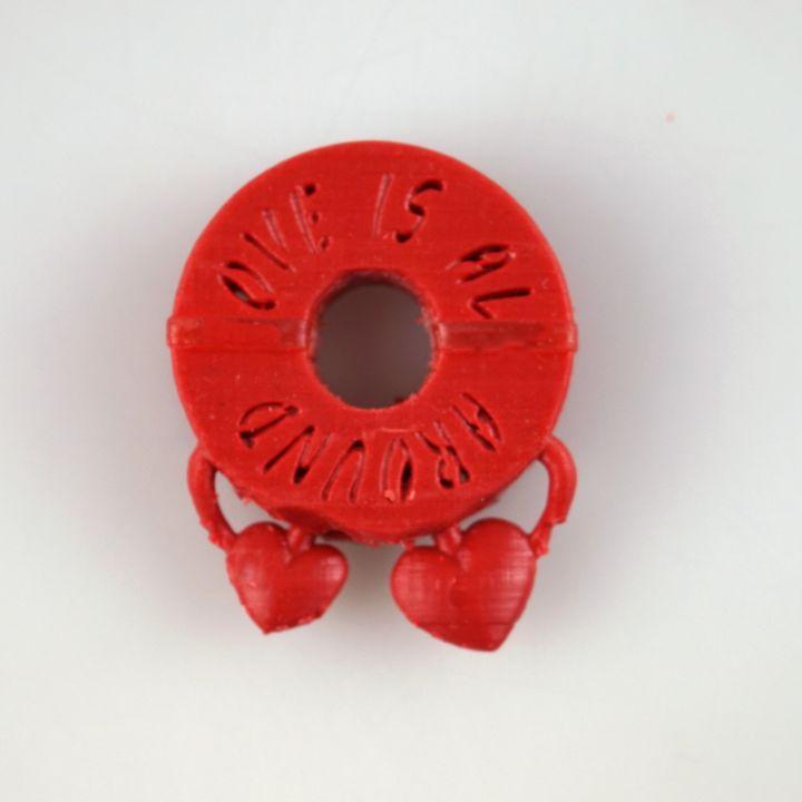 LOVE IS ALL AROUND KINETIC PENDANT