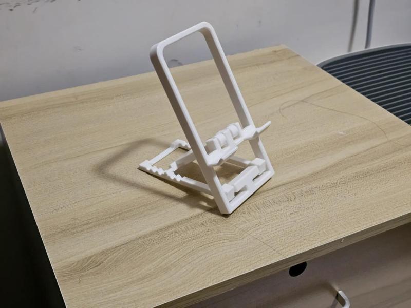 Phone holder with integrated charger, remixed from PolyMaker phone holder