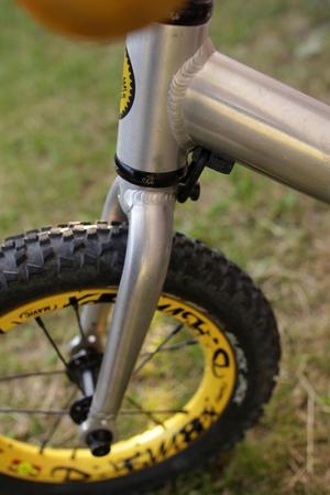 steering damper clamp for a Kokua Jumper balance bike - cable routing option