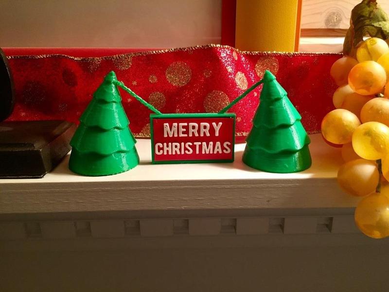 Sagging trees Christmas sign