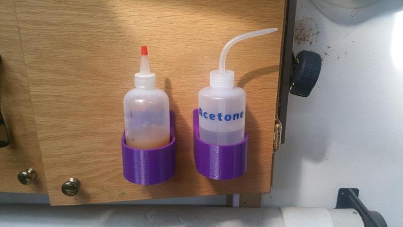 8 Oz. Squeeze / Storage Bottles Holder from Harbor Freight.