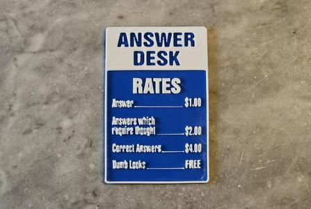 Answer desk rates sign.