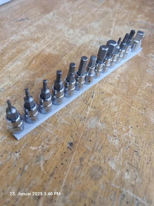 Traeger für 1/4 Zoll Stecknuesse   