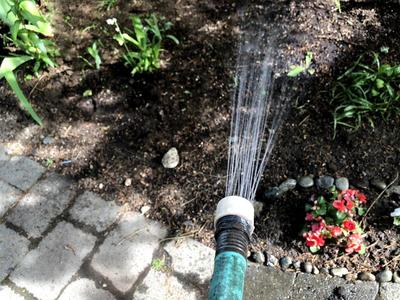 Spraying Garden Hose Head