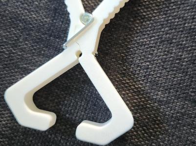 Spring towel pin 