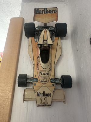 Wall holder for paper formulas