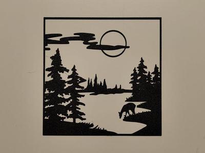 deer in lake landscape