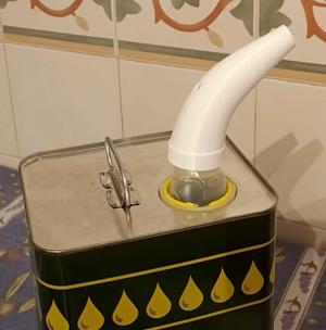 Spout pouring olive oil (or other fluids)