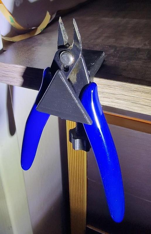 a holder for cutting pliers